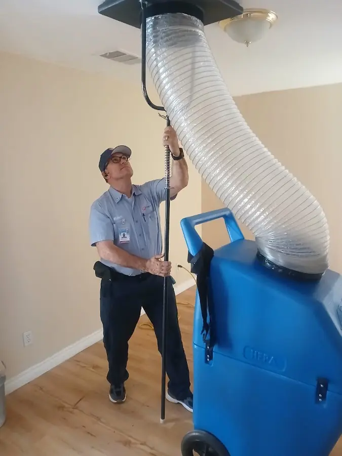 HVAC Installation technician using HEPA equipment in Templeton